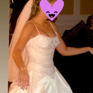 Antique white vintage size 4 Lazaro Wedding gown, headpiece and veil.